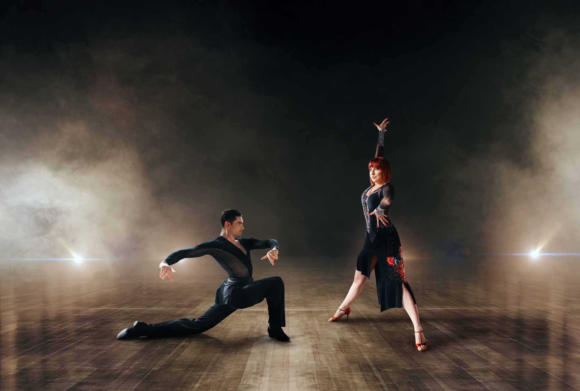 Elegant dancers, pair dancing on stage