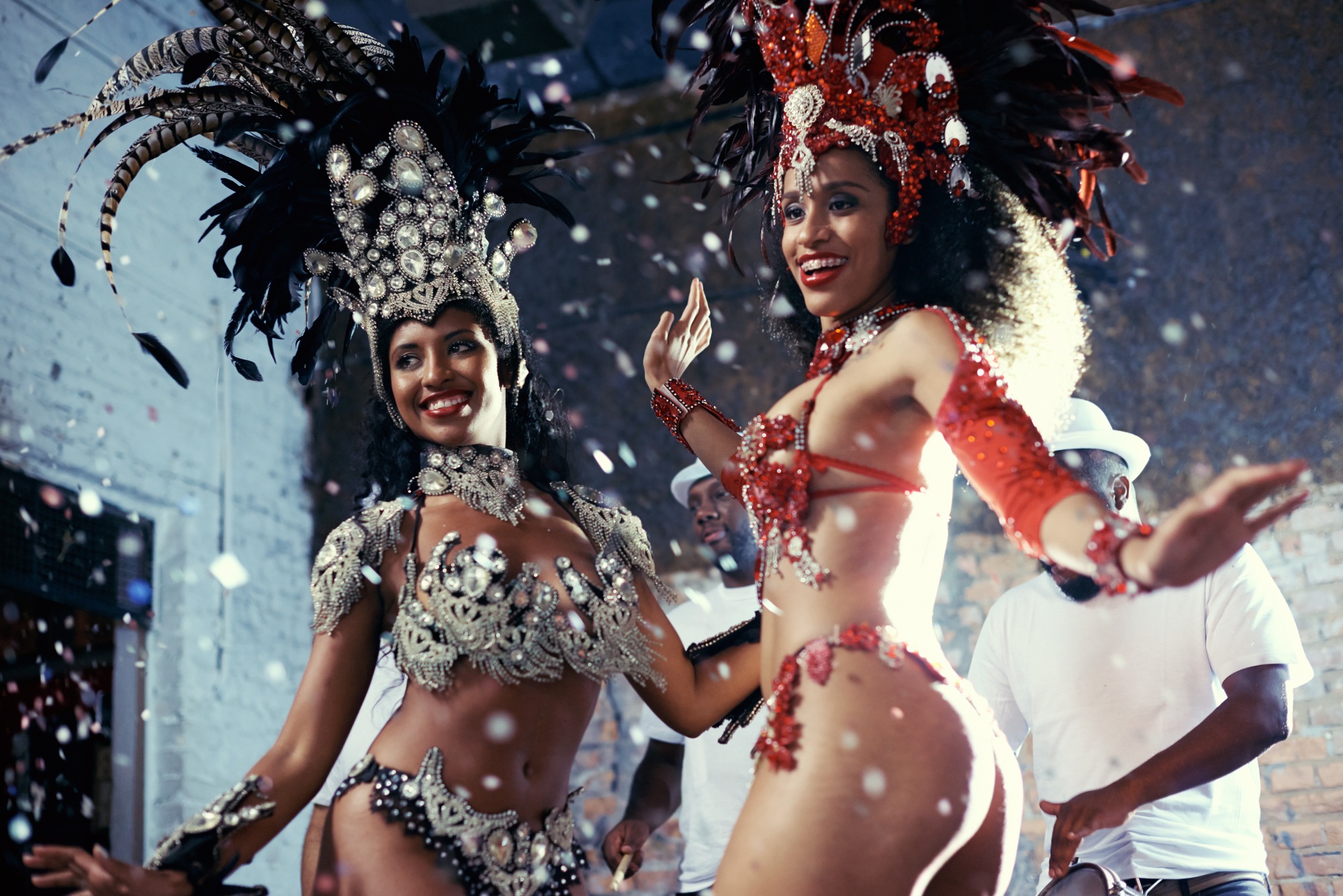 Samba. Shot of two beautiful samba dancers performing in a carnival.